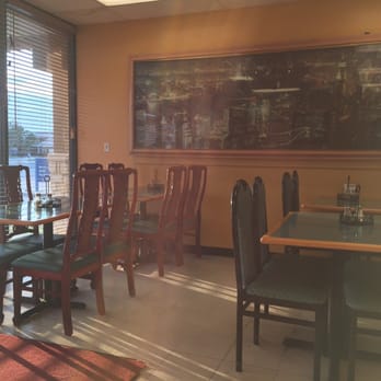 Golden China - The dining room with a cool picture - Chinese Near Me - Oklahoma City, Oklahoma Golden China - The dining room with a cool picture - Chinese Near Me - Oklahoma City, Oklahoma