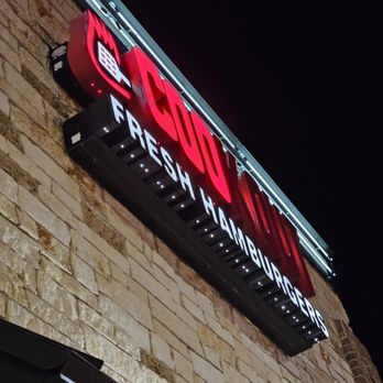 Cook Out - The restaurant's sign above the entrance to the restaurant. Some of the letters were not lit. But no problem, customers continued going in. - Burgers Near Me - Roanoke, Virginia Cook Out - The restaurant's sign above the entrance to the restaurant. Some of the letters were not lit. But no problem, customers continued going in. - Burgers Near Me - Roanoke, Virginia