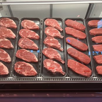 Texas Roadhouse - Displayed in the front of the restaurant. The different steaks they have to offer. - American Near Me - Henderson, Nevada