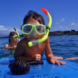 Tiny Bubbles Scuba - Snorkel Kid on Boogie Board at Kapalua Bay, Maui with Tiny Bubbles Scuba