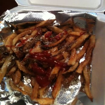 The Latin Wagon - Fries with spicy ketchup and cheese. - Street Vendors Near Me The Latin Wagon - Fries with spicy ketchup and cheese. - Street Vendors Near Me