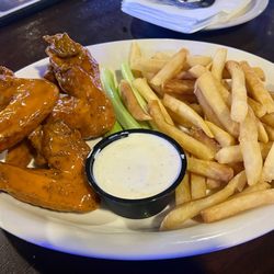 The Peanut - 1/2 order wings w/ fries. Hands down, best wings ever. Fries are spectacular too--Crispy outside w/ soft inside. Pairs beautifully w/ ranch.