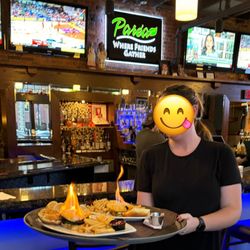 Parea Restaurant - Saganaki (flambéed tableside) on our Parea Burgers