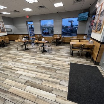 Jersey Mike's Subs - Interior, nice tables. - Fast Food Near Me - Sneads Ferry, North Carolina