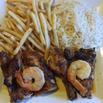 Palm Harbor Grill - BBQ chicken with garlic shrimp (fries & rice in the side) - Portuguese Near Me - Palm Coast, Florida