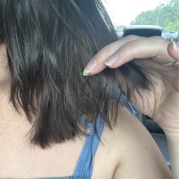 you can see the horrendously uneven layers and the GIANT chunk of longer hair in the front???????