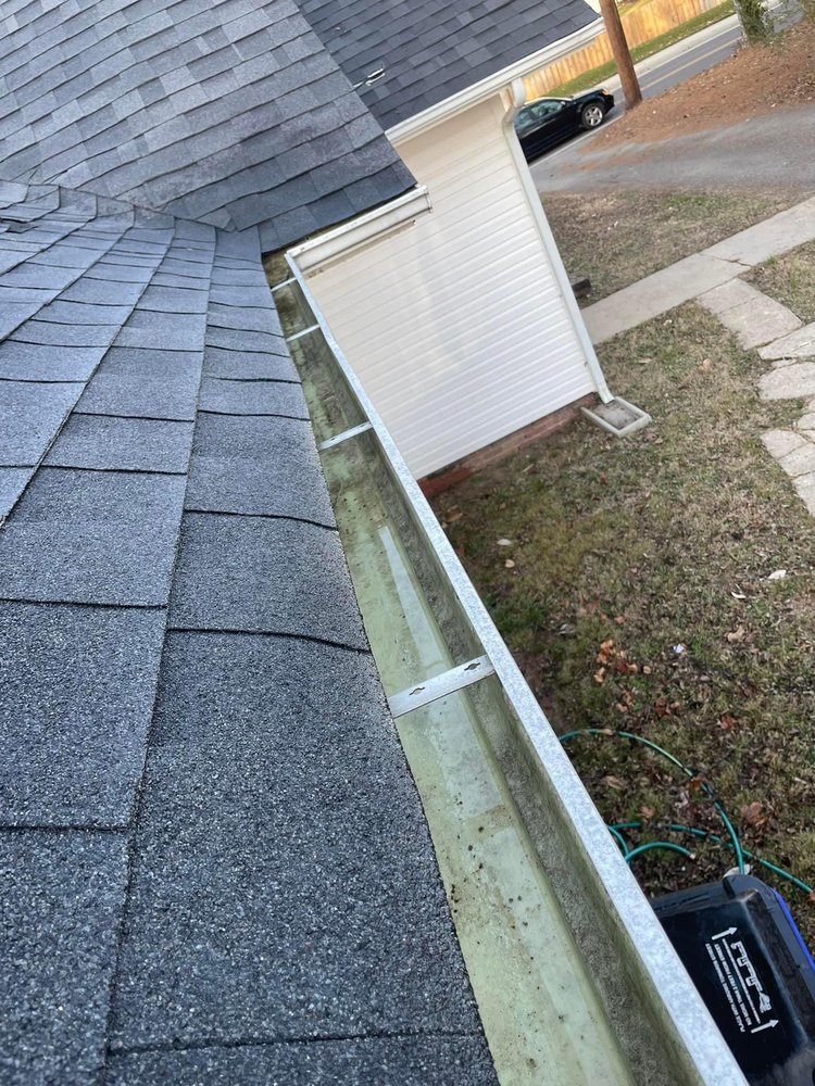Slide of Spootless Roofing