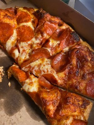 Photo of Shakers Pizza - Fremont, CA, US. Half eaten pepperoni pizza