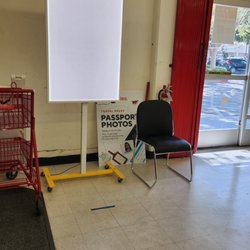 Staples - Passport photo background (at the right of the store once you walk in)