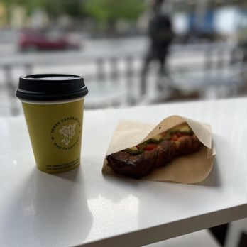 Caffe Umbria - Flat white and a crunchy tomato pesto croissant - Coffee & Tea Near Me - Chicago, Illinois Caffe Umbria - Flat white and a crunchy tomato pesto croissant - Coffee & Tea Near Me - Chicago, Illinois