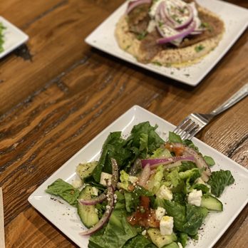 Olea - Greek Salad are awesome, light and flavorful Hummus w/ Pork & GF Pita Bread - Mediterranean Near Me - Fayetteville, North Carolina Olea - Greek Salad are awesome, light and flavorful Hummus w/ Pork & GF Pita Bread - Mediterranean Near Me - Fayetteville, North Carolina