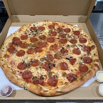 Proletariat Pizza - Two Meats (plus mushroom) - Pizza Near Me - Seattle, Washington Proletariat Pizza - Two Meats (plus mushroom) - Pizza Near Me - Seattle, Washington
