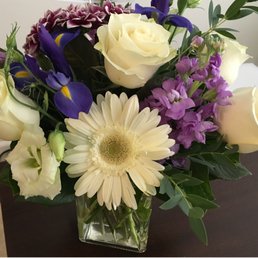 Ordered a white and purple medium-sized arrangement over the phone without seeing them first, and they did a beautiful job. So pleased!!