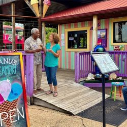 A family enjoys ice cream from Uranus.