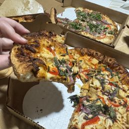 Thai Curry Pizza (front) and Crying Tiger (back) Thai Curry Pizza (front) and Crying Tiger (back)