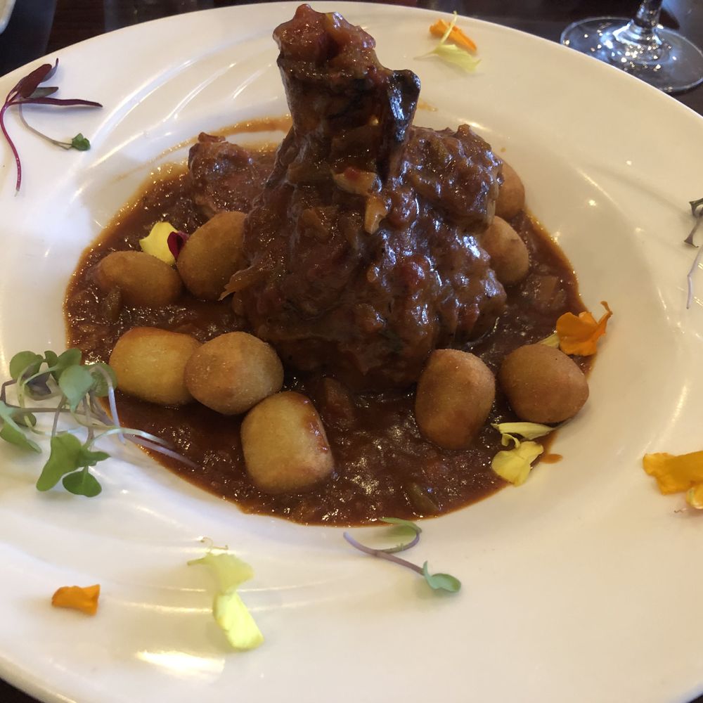 Parmesan Pete's Italian Kitchen - Savory Pork Osso Bucco - Italian Near Me - Naples, Florida Parmesan Pete's Italian Kitchen - Savory Pork Osso Bucco - Italian Near Me - Naples, Florida