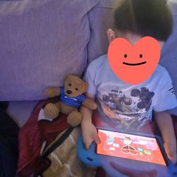 My son and his little teddy bear