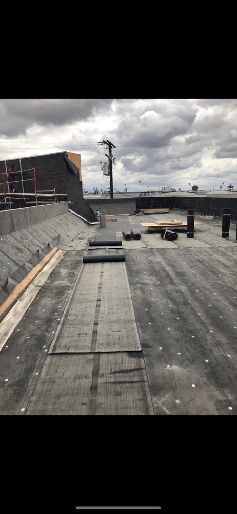 Slide of J.P Roofing Enterprise