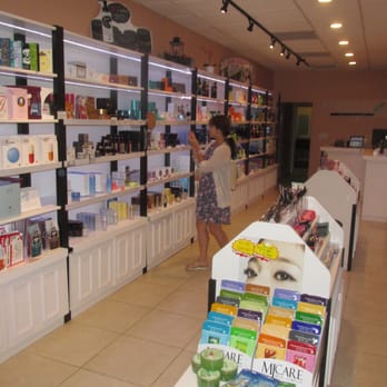 Korean Beauty - A Korean language teacher perusing the shelves of Korean skincare products at Korean Beauty. - Cosmetics & Beauty Supply Near Me - Chicago, Illinois
