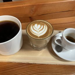 Coffee flight: house drip, piccolo (small latte), espresso