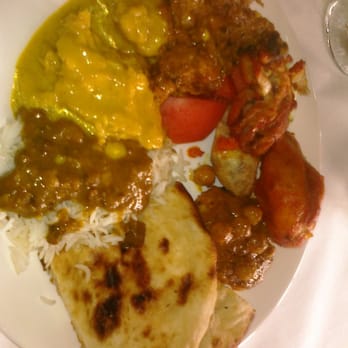 Tandoor Restaurant - Plate of Food from the lunch buffet: Naan, rice, dahl, Panjabi Kadi, Tandoori Chicken - Indian Near Me - Rego Park, New York Tandoor Restaurant - Plate of Food from the lunch buffet: Naan, rice, dahl, Panjabi Kadi, Tandoori Chicken - Indian Near Me - Rego Park, New York