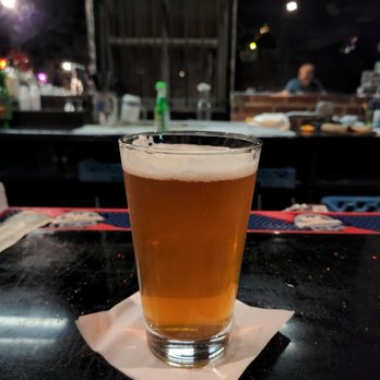 Black Cat - a glass of beer on a table - Music Venues Near Me - Washington, DC, District of Columbia