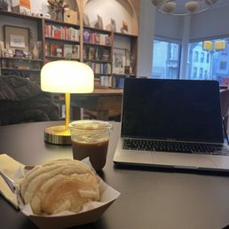Concha bun and iced cortado Concha bun and iced cortado