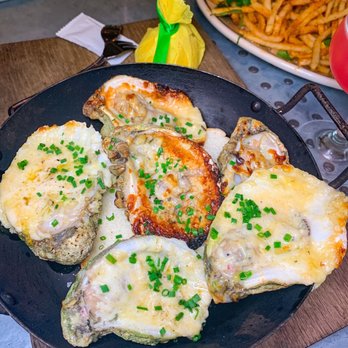 La Lucha - Garlic Parm Oysters (@paigeeatshouston on Instagram) - Seafood Near Me - Houston, Texas