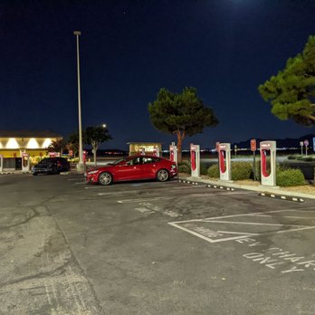 Tesla Supercharger - Sexy red Tesla next to superchargers - EV Charging Stations Near Me - Hesperia, California Tesla Supercharger - Sexy red Tesla next to superchargers - EV Charging Stations Near Me - Hesperia, California
