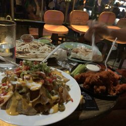 1889 - The food they get from the restaurant across from them since they only serve drinks here