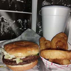 Chuckburger - This is the double hamburger with the order of onion rings and large Coke half-ice .