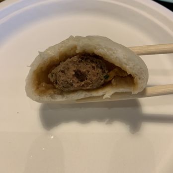 H Noodle House - Inside of steamed pork bao (buns). - Chinese Near Me - Jericho, New York H Noodle House - Inside of steamed pork bao (buns). - Chinese Near Me - Jericho, New York