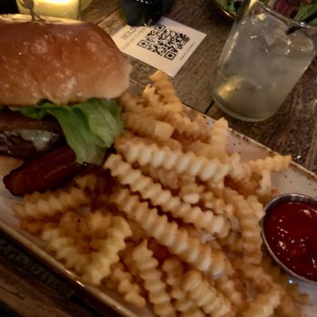 Hold Fast Kitchen & Spirits - Their burger with added cheese, bacon, and fries. - New American Near Me - New York, New York Hold Fast Kitchen & Spirits - Their burger with added cheese, bacon, and fries. - New American Near Me - New York, New York