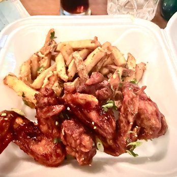 Juniper - Wings and duck fries. (I boxed up half of each) - New American Near Me - Birmingham, Alabama