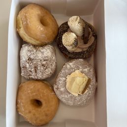 Glazed, tiramisu, s'mores, and NY cheesecake donuts Glazed, tiramisu, s'mores, and NY cheesecake donuts