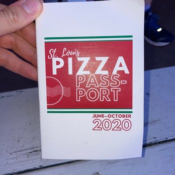 Pizza World - a hand holding a box of pizza - Pizza Near Me - Shrewsbury, Missouri Pizza World - a hand holding a box of pizza - Pizza Near Me - Shrewsbury, Missouri