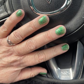 Classy Nails Lounge - The green glitter is uneven and in places see through. Also, my hands are dry because I was not offered any hand treatment, even lotion. - Nail Salons Near Me - Phoenix, Arizona