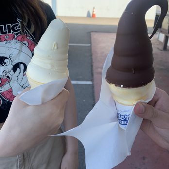 Fosters Freeze - Regular vanilla cone and a vanilla cone dipped in chocolate - Burgers Near Me - San Leandro, California Fosters Freeze - Regular vanilla cone and a vanilla cone dipped in chocolate - Burgers Near Me - San Leandro, California
