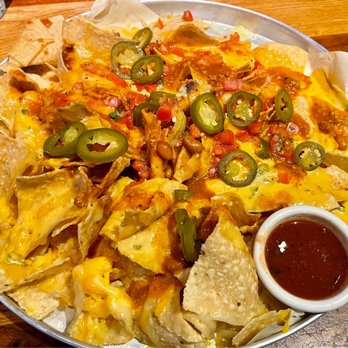 BJ's Restaurant & Brewhouse - Loaded Nachos (chili with beans) - Pizza Near Me - Slidell, Louisiana BJ's Restaurant & Brewhouse - Loaded Nachos (chili with beans) - Pizza Near Me - Slidell, Louisiana