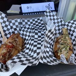The Wiener & Bun - Hot sausage w garlic sambal, Caramelized onion, bacon bits and the Rising Son Dog