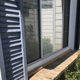 Front window with tilted redwood strip at bottom.