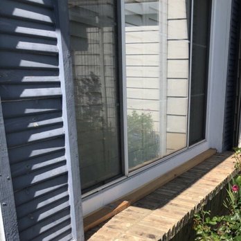 Expolight construction - Front window with tilted redwood strip at bottom. - General Contractors Near Me - Citrus Heights, California
