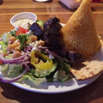 Romo's Mediterranean Grill - Sirloin kabobs with lemon rice. The chickpeas are a nice touch. :-) - Mediterranean Near Me - Logan, Utah