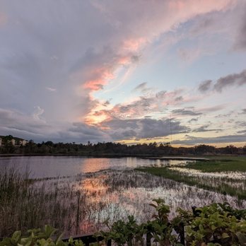 Texas Roadhouse - a view of a lake at sunset - Barbeque Near Me - Orange City, Florida