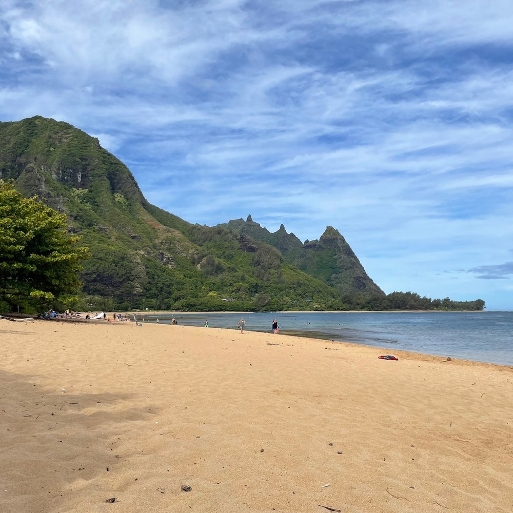 Broad expanse of sandy beach, uncrowded at 1pm and scored a spot in the teeny lot before you hit the Dry Caves!