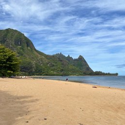 Broad expanse of sandy beach, uncrowded at 1pm and scored a spot in the teeny lot before you hit the Dry Caves!