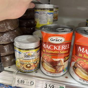 Publix Super Market - a person grabbing a can of mackel in tomato sauce - Grocery Near Me - Gulf Shores, Alabama Publix Super Market - a person grabbing a can of mackel in tomato sauce - Grocery Near Me - Gulf Shores, Alabama