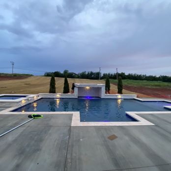Commander Pools - Firebowls on each side of the grotto coming soon - Pool & Hot Tub Service Near Me - Edmond, Oklahoma