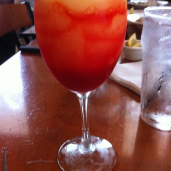 Cheddar's Scratch Kitchen - Peach Bellini with strawberry in it & a cherry on top! - American Near Me - Dallas, Texas