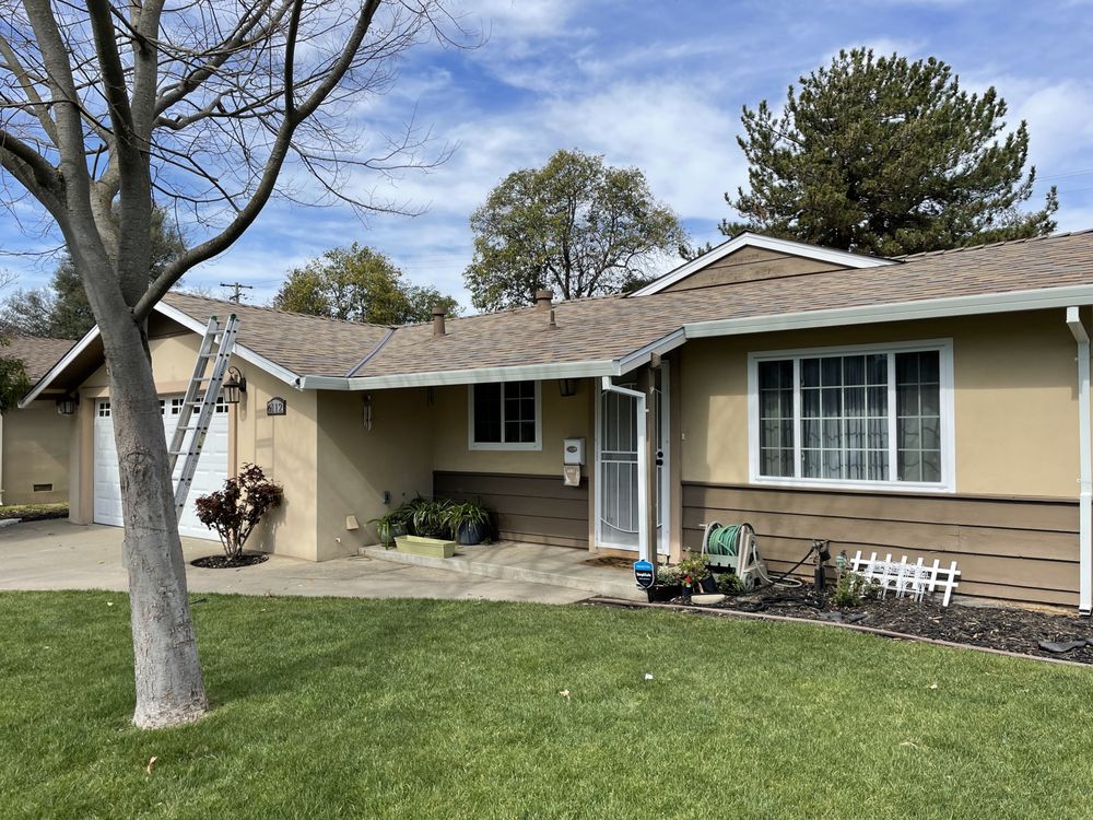 Slide of Triark Roofing